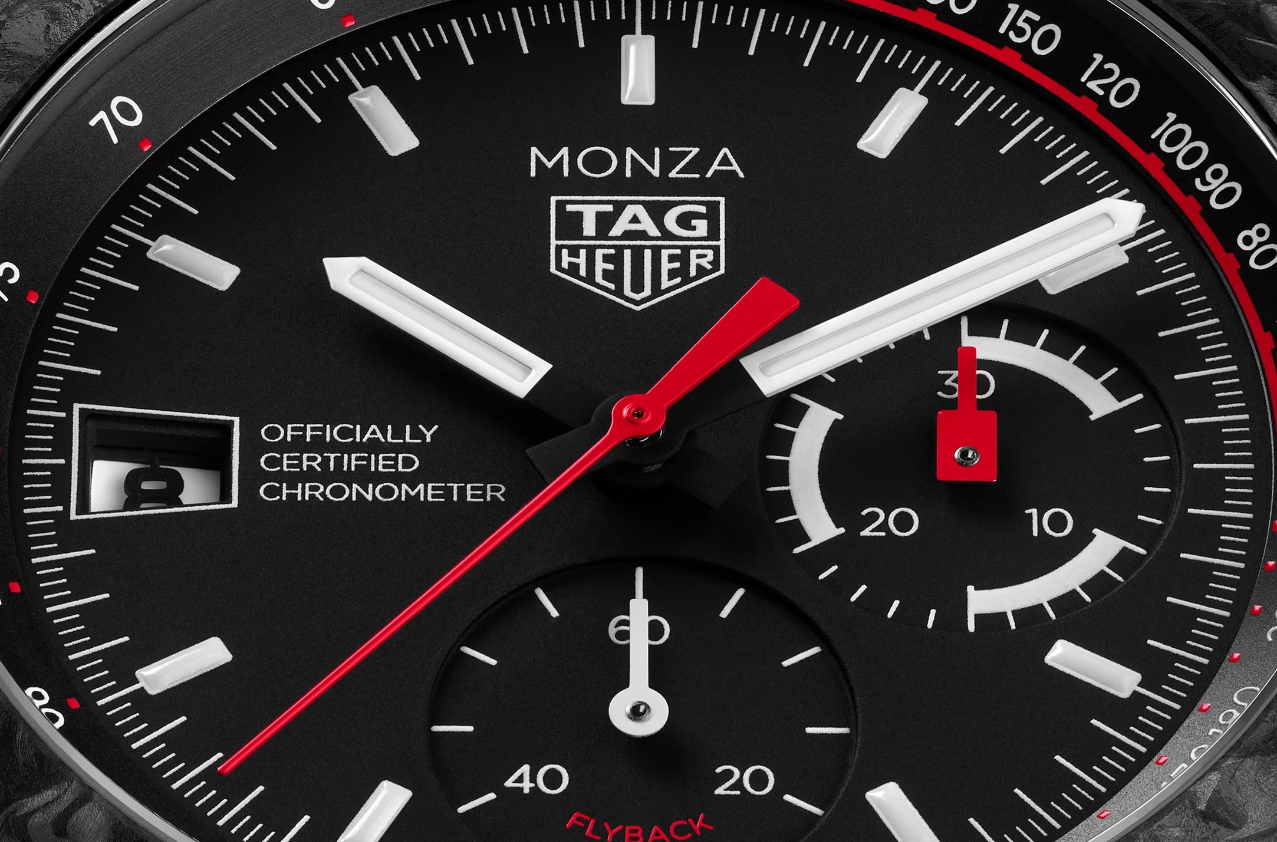 Close view of the original Monza black dial with red chronograph accents