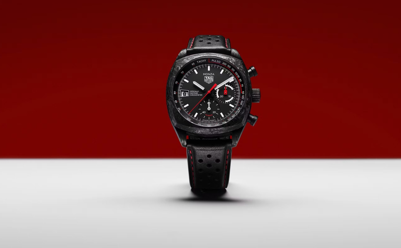 Original TAG Heuer Monza Flyback Carbon watch on a red background